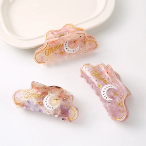 Elegant moon and cloud marble acetate hair claws set with rhinestones and gold Moon lettering