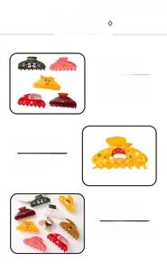 Détail de pinces à cheveux de Noël en acétate avec motifs de Père Noël et de renne