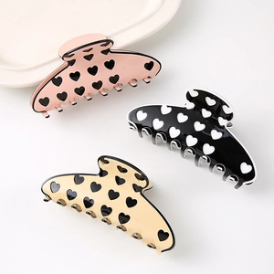 Lot de trois pinces à cheveux minimalistes à motif cœur en rose, noir et beige
