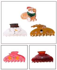 Lot de cinq pinces à cheveux de Noël avec chat, bonhomme de neige, renne et pain d'épice