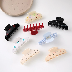 Set of 8 butterfly hair claws with rhinestones in various colors for women's hair styling