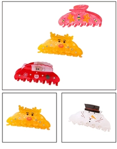 Détails de quatre pinces à cheveux de Noël avec des motifs de Père Noël et de renne