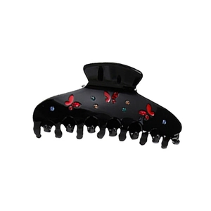 Elegant black hair claw clip with red butterflies and colorful rhinestones on white background