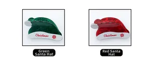 Detailed view of red and green Santa hat hair claws with Christmas text and glitter finish