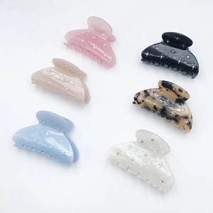 Set of six colorful starry acetic acid hair claws with sparkling rhinestone accents