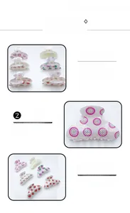 Detailed view of the fruit-patterned hair claw clip featuring a spring mechanism