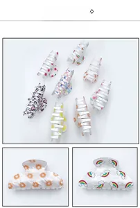 Détails de grandes pinces à cheveux en acrylique aux motifs variés de cerises et d'arcs-en-ciel