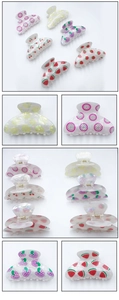 Detail view of colorful PVC fruit claw clips with secure metal spring and smooth teeth