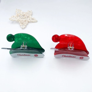 Christmas hat hair claw clip with marble texture and festive snowflake pattern