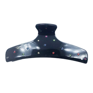 Elegant black acetate hair claw clip with colorful rhinestones and curved grip design