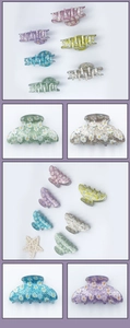 Detailed close-up showing daisy prints on glitter acrylic hair claws in multiple colors