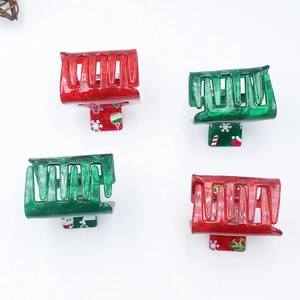 Weihnachtliche Haarklammern aus Acryl in Rot und Grün mit festlicher Marmorierung