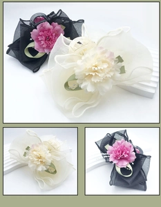 Detailed close-up of double-sided mesh flower hair claw with elegant pearls and petals