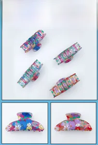 Detailed views of floral print hair claws in multiple colors with high-quality PVC finish