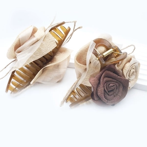 Vintage resin hair claw clips with 3D fabric rose flowers in amber translucent finish