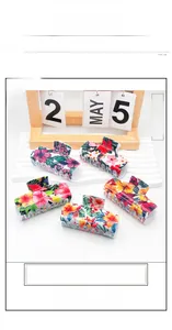 Detailed set of large floral hair claws in five colors for thick hair styling