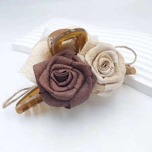 French vintage resin hair claw clip with double fabric roses in brown and champagne
