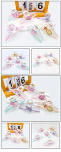 Detailed view of six-piece set acrylic hair claws with various traditional Chinese motifs