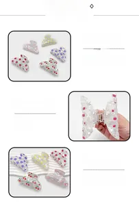 Detailed macro view showing strawberry and cherry print patterns on durable PVC hair clips