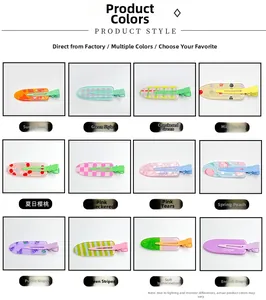 Flat lay of seamless hair clips featuring fruit patterns and colorful resin textures