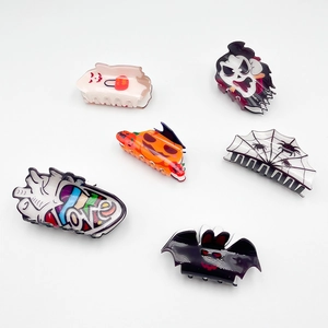 6-pack Halloween acrylic hair claws featuring pumpkin ghost bat and spider web designs