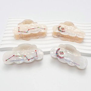 Barrettes à cheveux élégantes en acétate en forme de nuage avec strass étoile et lune
