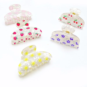 Set of five large fruit print PVC hair claws with strawberry cherry and floral patterns