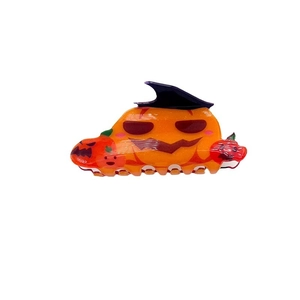 Halloween pumpkin hair claw clip with black wizard hat and festive spooky faces pattern