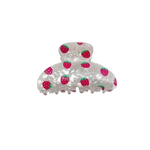 Elegant white PVC hair claw clip with red strawberry print and marble texture for women