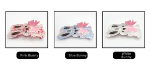 Detailed set of cute acetate rabbit hair clips with pink bows in pink, blue, and white marble