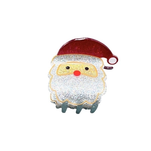 Sparkling Santa Claus hair claw clip with red hat and glitter finish for Christmas parties