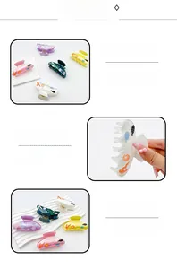 Detail view of large acrylic hair claws with ocean motifs and varied pastel colors