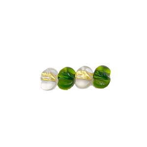 Elegant amber-style hair clip with green and white resin ovals and gold foil details
