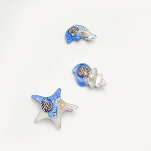 Barrettes à cheveux thème océan dauphin et étoile de mer en résine bleue et perles
