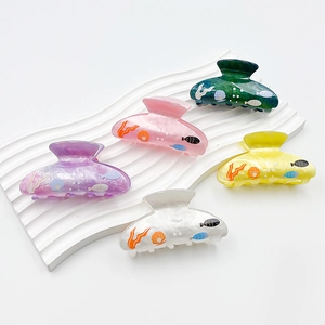 Large acrylic hair claws with ocean prints like fish and shells in five assorted colors
