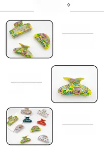 Close-up of colorful acrylic hair claw with School print and hollow square design