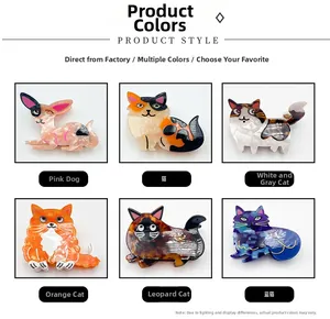 Detail view of 6 stylish acetate animal hair claws featuring cat and dog cartoon patterns
