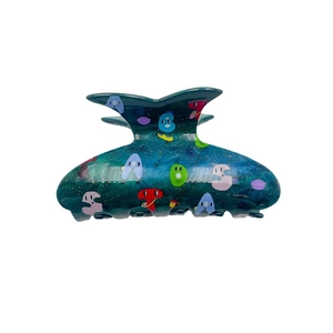Sparkly dark blue acrylic claw clip with colorful cute ghost patterns for school