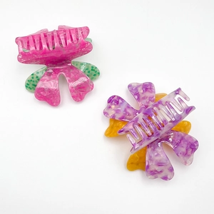 Floral acetate hair claw clips with marble texture in pink green and purple yellow colors