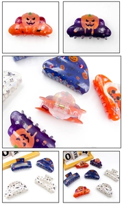 Detailed macro of acrylic Halloween hair clips featuring spooky pumpkins and bats