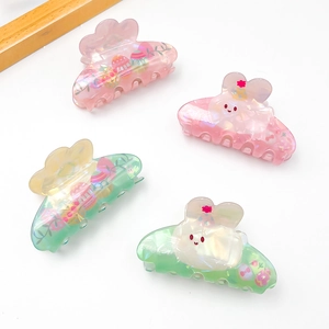 Easter hair claw clips featuring cute bunny and colorful egg designs in iridescent acrylic