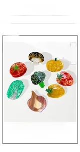 Selection of creative vegetable-shaped acetate hair claws including pumpkin and broccoli