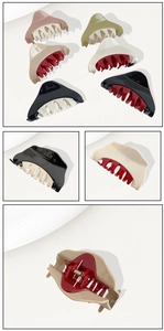 Detailed view of color-block resin hair claw clips with durable inner metal springs