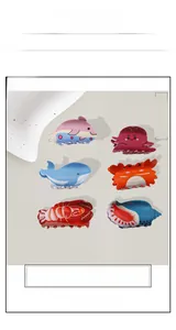 Detail showing various cute cartoon ocean animal hair claws including octopus and crab designs
