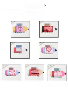 Detail view of pencil-shaped hair claws with Valentine's patterns and festive prints