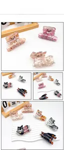 Detailed views of cute animal hair claws featuring bear and dog patterns in multiple colors