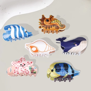Cute PVC ocean-themed hair claw clips featuring starfish, seahorse, and whale designs