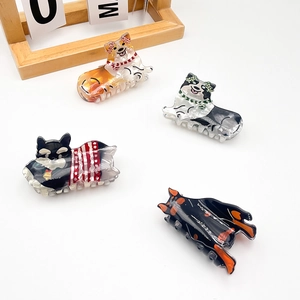 Cute acetate hair claws featuring cartoon dog and cat designs for women and girls