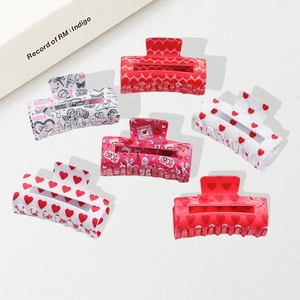 Lot de six pinces à cheveux Saint-Valentin avec motifs de cœurs rouges et roses