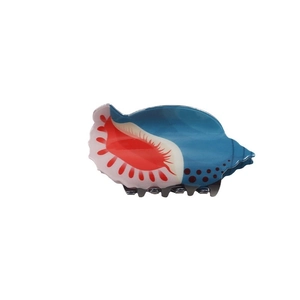 Conch shaped hair claw clip in blue and red acetate with polished finish for women